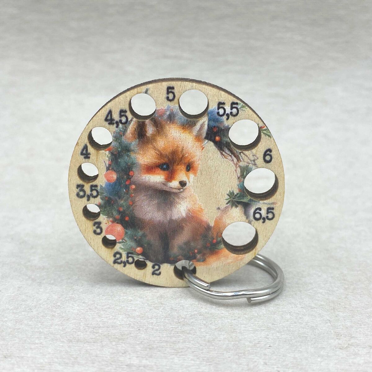 Kettu puikkomitta avaimenperä.