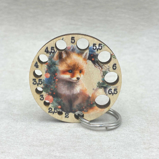 Kettu puikkomitta avaimenperä.